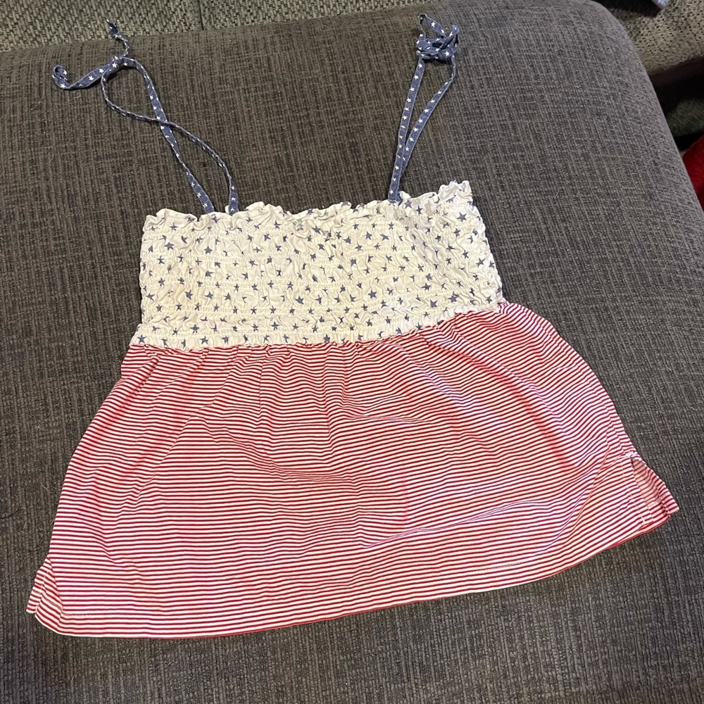 American flag based shirt size 8 in children.